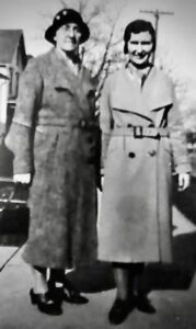 Photo of Nellie Hanrahan with member of Dunne family